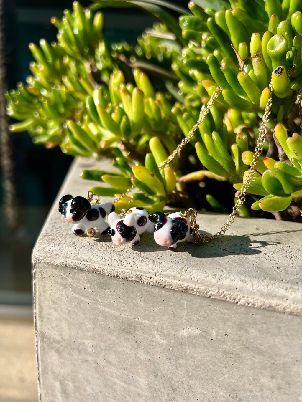 cow-shaped pendants