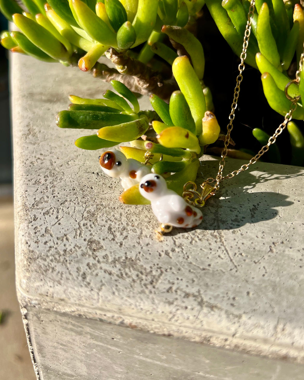 otter glass beads