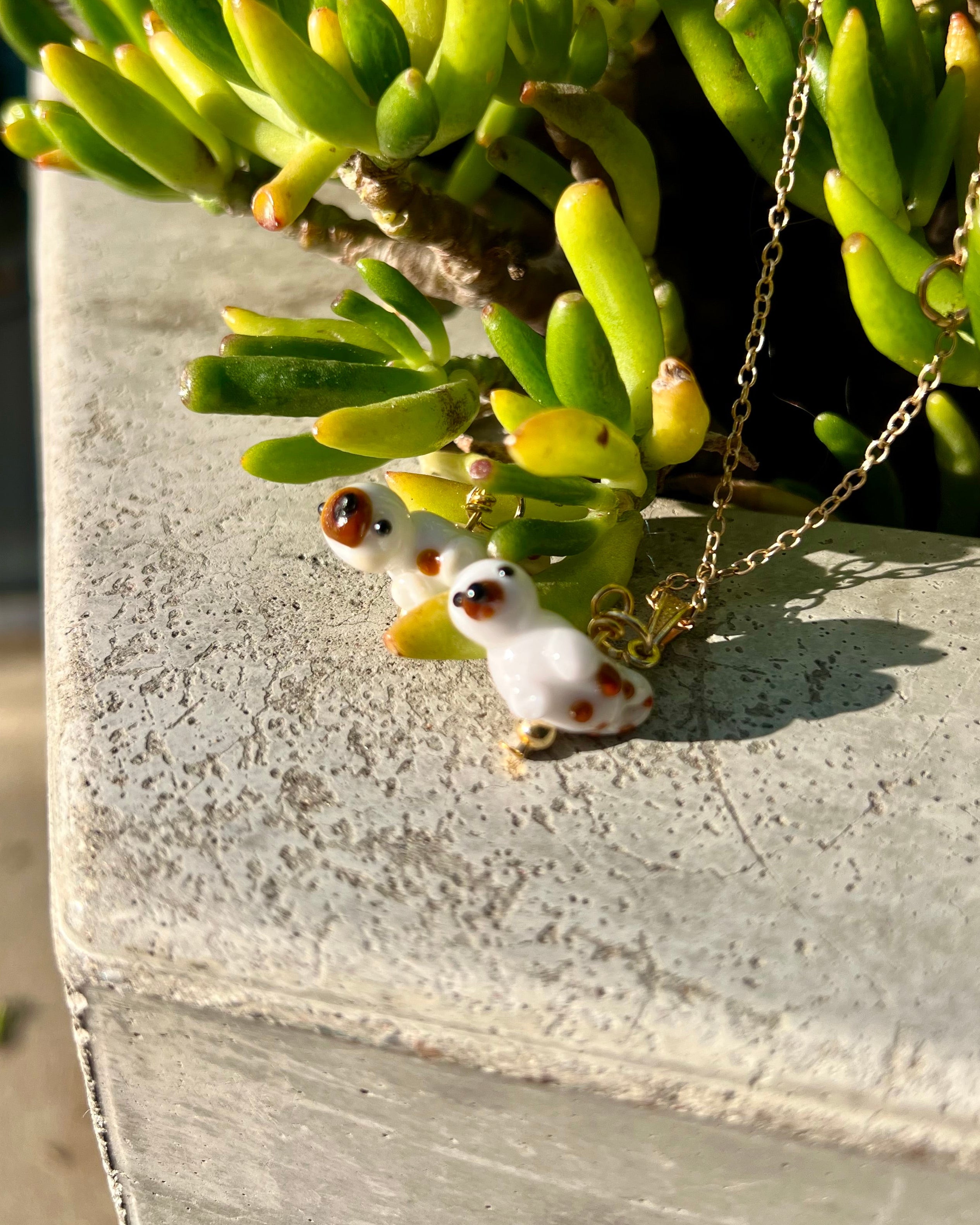 otter glass beads